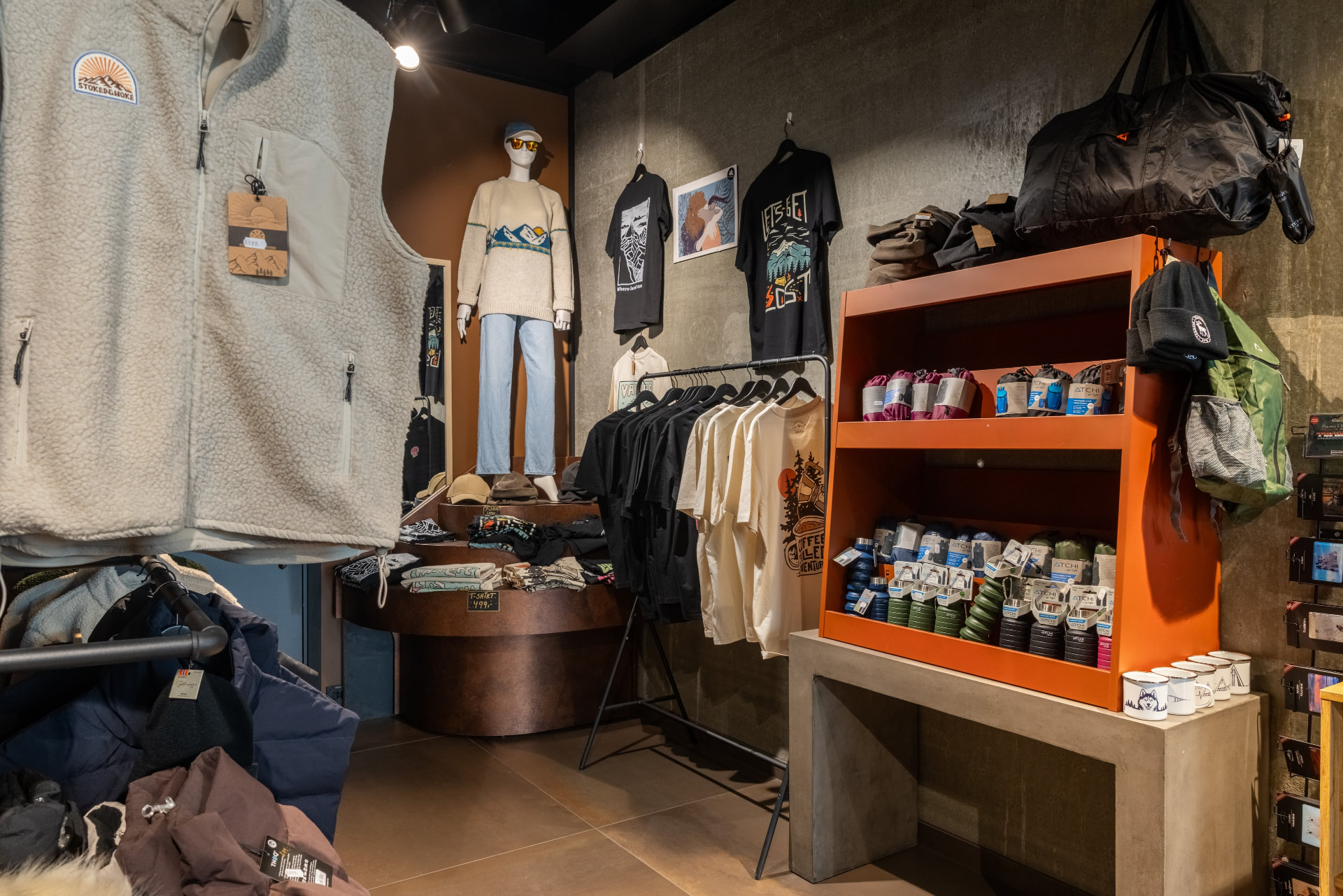 Clothing, hats, bags and outdoor gear in the shop